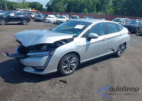 2018 Honda Clarity Plug-In Hybrid из США, поврежденный, VIN JHMZC5F17JC017131